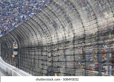 Martinsville, VA - Oct 30, 2016: A NASCAR Official Holds The Caution Flag During The Goody's Fast Relief 500 At The Martinsville Speedway In Martinsville, VA.


