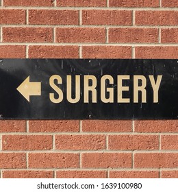 Martlesham Heath, Suffolk, UK - 8 February 2020: Sign To A GP Surgery On A Brick Building Wall.     