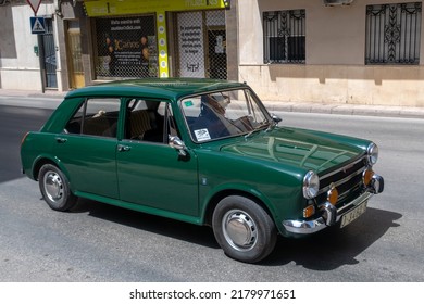 Martos - Jaen - Spain On 3rd Of July Of 2022: Concentration Of Classic Cars: A Green Station Wagon Simca 1200 From The 70s Driving