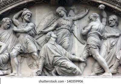 The Martyrdom of St. Stephen pediment of the front door of the Saint Etienne du Mont Church, Paris.