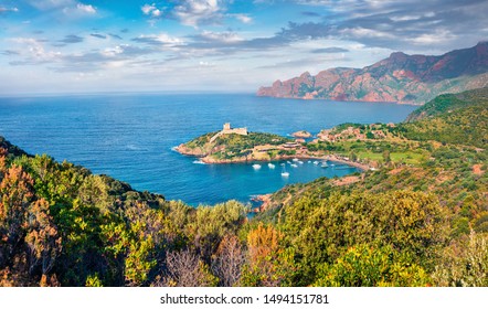 Marvelous Morning View Of Port De Girolata - Place, Where You Can't Get By Car. Green Sunny Scene Of Corsica Island, France, Europe. Captivating Mediterranean Seascape.