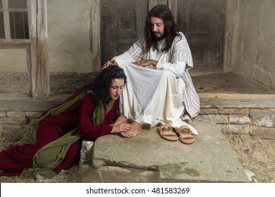 Mary Magdalene crying of shame and embalming Jesus' feet