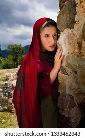 Mary Magdalene Standing At The Entrance Of The Empty Tomb Of Jesus On Easter Morning