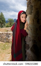 Mary Magdalene Standing At The Entrance Of The Empty Tomb Of Jesus On Easter Morning