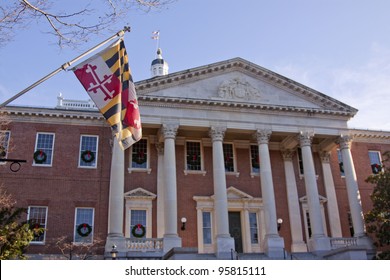 The Maryland State Flag At The North Entrance Of The State House In Annapolis, MD. Where The Maryland General Assembly Convenes For Three Months A Year.