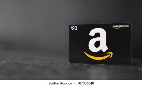 Maryland, United States of America - Jan 6 : Amazon.com Gift Card on desk, black and white