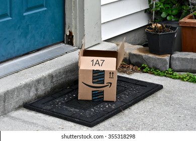 MARYLAND, USA - DECEMBER 26, 2015: Image Of An Opened And Stolen Amazon Package. Amazon Is The Largest Internet-based Retailer In The United States.