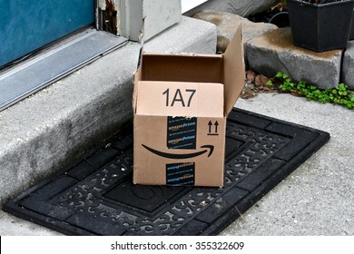 MARYLAND, USA - DECEMBER 26, 2015: Image Of An Opened And Stolen Amazon Package. Amazon Is The Largest Internet-based Retailer In The United States.