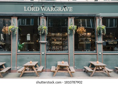 Marylebone, London / United Kingdom - March 26, 2018: Empty Brenches And Table Outside A Irish Pub Named 