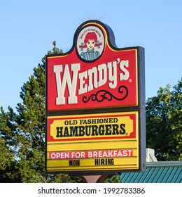 Marysville, WA, USA - June 16, 2021; A Billboard Outside A Wendy's Restaurant In Marysville Washington Advertising Breakfast And Job Openings