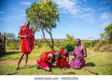 Masai Mara, Kenya »; August 2018: A Group Of Masais Preparing Fire As Before With Wood