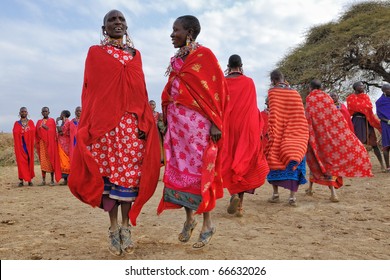 MASAI MARA, KENYA - AUGUST 23: Group Of Unidentified African Women From Masai Tribe Show A Traditional Jump Dance On August 23, 2010 In A Local Village Near Masai Mara National Park.