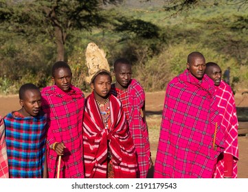 Masai Mara, Kenya - August 4, 2022: Masai People In Loca Village Near Masai Mara National Park.