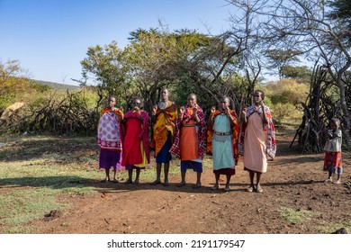 Masai Mara, Kenya - August 4, 2022: Masai People In Loca Village Near Masai Mara National Park.