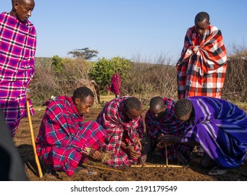 Masai Mara, Kenya - August 4, 2022: Masai People In Loca Village Near Masai Mara National Park.