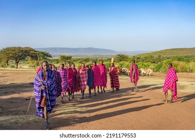 Masai Mara, Kenya - August 4, 2022: Masai People In Loca Village Near Masai Mara National Park.