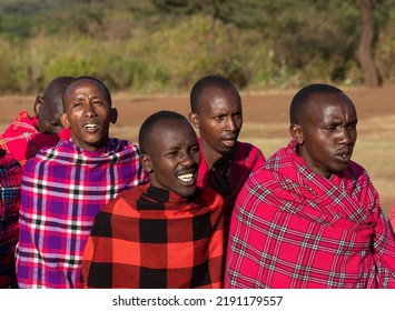 Masai Mara, Kenya - August 4, 2022: Masai People In Loca Village Near Masai Mara National Park.