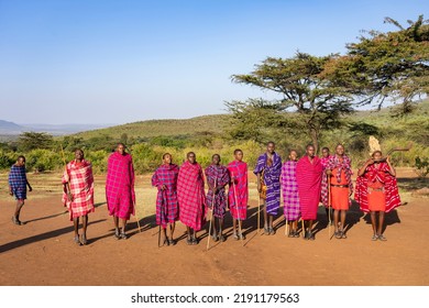 Masai Mara, Kenya - August 4, 2022: Masai People In Loca Village Near Masai Mara National Park.