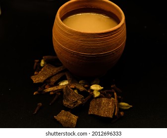 Masala Chai in traditional kullad ceramic pot with Indian spices
