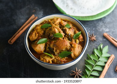 Masala Chicken Curry With Appam Kerala Breakfast , Hoppers Pan Cake , Homemade Chicken Roast Indian Spices , Asian Cuisine Spicy Meat Curry Cooked In Coconut Milk . Side Dish Christian Food Christmas