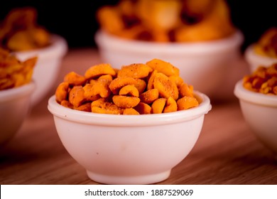 Masala Shing Namkeen Or Roasted Spicy Peanuts On Wooden Table With Onion And Green Chili,Masala (Spices) Peanuts Coated With Spice