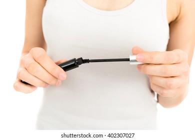 Mascara Bottle In The Female Hands