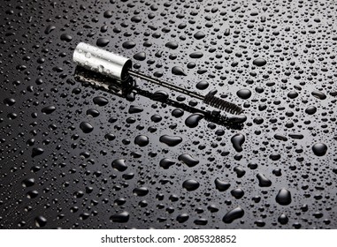 Mascara Wand On Wet Background