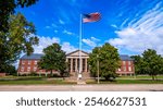 Mascoutah, IL—Sept 28, 2024; American flag in front of the historic 375th Airlift Wing headquarters building at Scott Air Force Base.