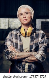 Masculine Tattooed Female Craftsman Portrait