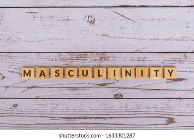 Masculinity Text On Wood Blocks, Wooden Background.