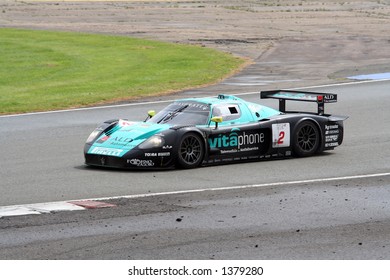 A Maserati MC 12 Racing Car On A Track (Vitaphone Racing Team - Davies/Biagi)