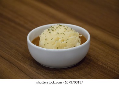 Mash Potato On Cup Wood Background