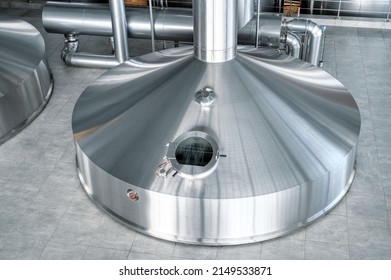 Mash vats of a brewery. Large metal fermentation tanks - Powered by Shutterstock