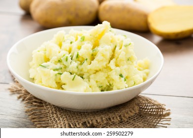 Mashed Potatoes With Chives Served In A Small Bowl.