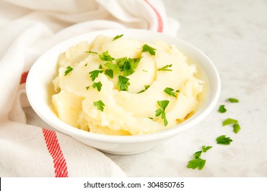 Mashed Potatoes With Parsley In White Bowl