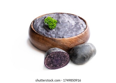 Mashed  Purple Potatoes In Wooden Bowl Isolated On White 