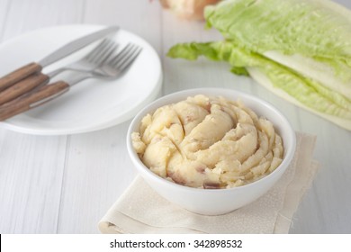 Mashed Red Potatoes Arranged In A White Bowl