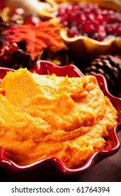 Mashed Sweet  Potatoes On Thanksgiving Table With Other Side Dishes