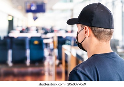 Mask At Airport. Man Waiting For Flight In Terminal.. Corona Virus, Covid19 And Travel. Tourist Wearing Facemask During Pandemic At Gate. Social Distance In Public. Vacation After Coronavirus Vaccine.