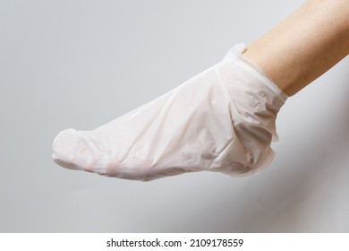 Mask And Cosmetic Foot Care At Home. Foot Mask.