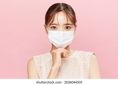 Mask Face Of A Young Asian Woman