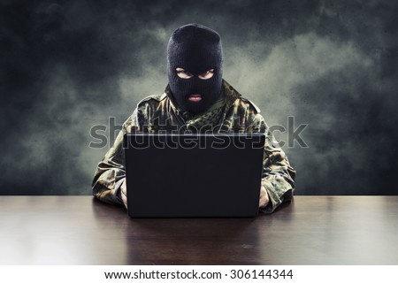 Masked cyber terrorist in military uniform hacking army intelligence Stock photo © 