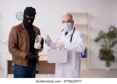 Masked Man Burglar Bribing Old Doctor For Getting Vaccine