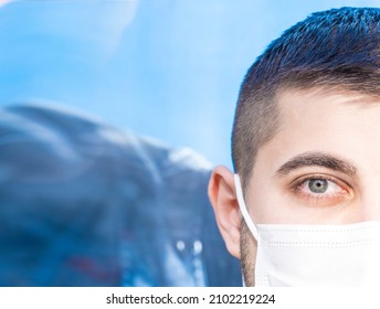 Masked Man Protecting Himself. Health Worker Wearing Hygienic Mask. Young Man. Ambulance Driver. Male Nurse. Masked Working Man. Empty Writing Space.