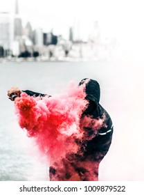 Masked Man With Red Smoke Grenade