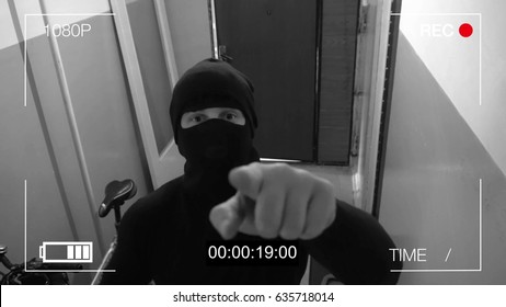 The Masked Robber Burst Through The Door And Threatened With A Knife In CCTV Camera.