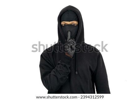 Masked thief isolated on white background