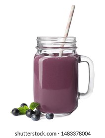 Mason Jar Of Acai Drink With Berries On White Background