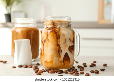 Mason Jar With Cold Brew Coffee On Table