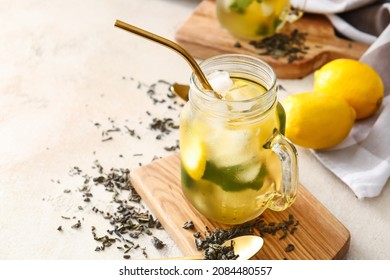 Mason Jar Of Tasty Cold Ice Tea On Table